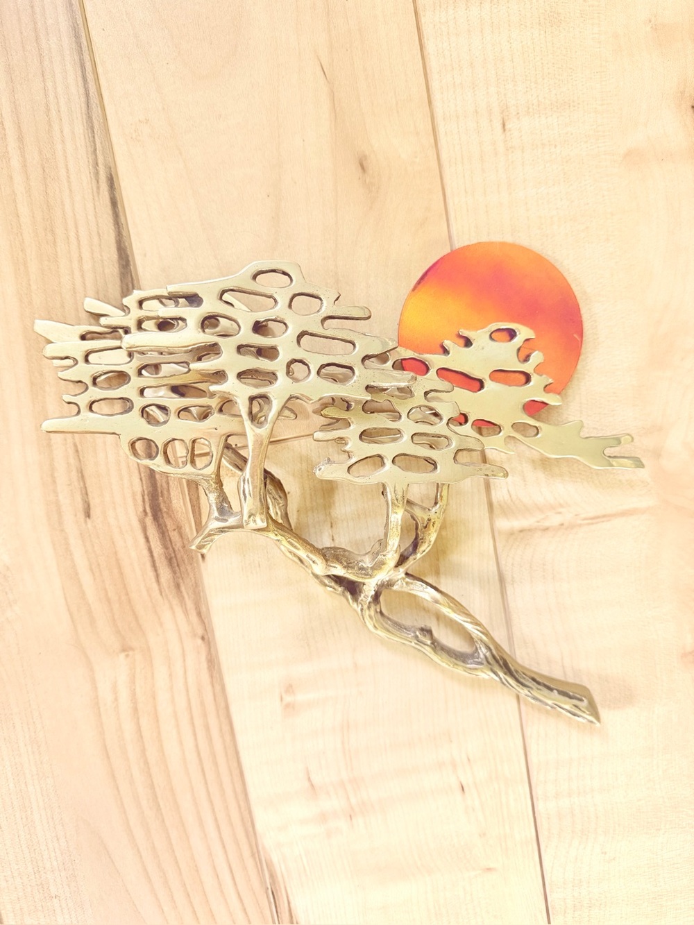 Vintage brass bonsai tree with sunset wall hanging